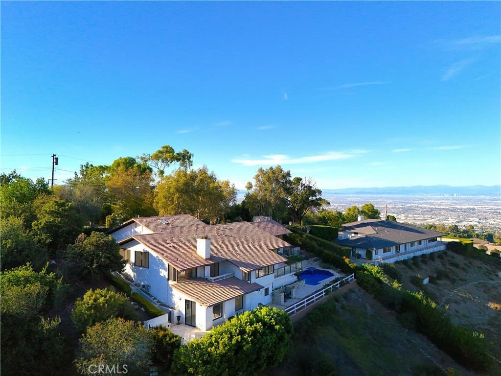 Just Listed: Gated Rolling Hills Retreat With Sweeping Views — gallery photo 3