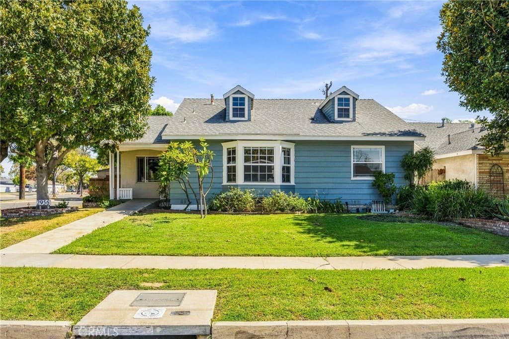 Just Listed: Charming Cape Cod Home with Pool — exterior view