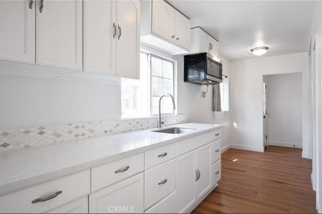 Turnkey Duplex with Garages & Built-In Rental Income — gallery photo 3
