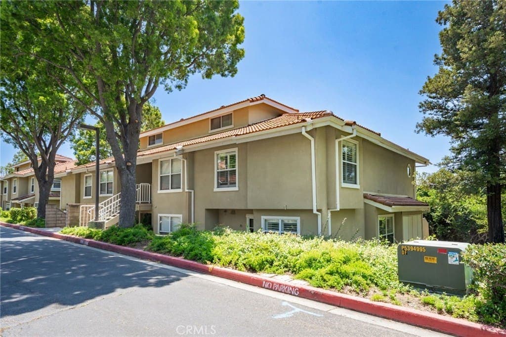 Just Listed | Updated End-Unit Townhome in Gated Canyon Club Villas — exterior view