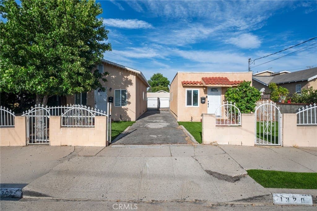 Turnkey Duplex with Garages & Built-In Rental Income — exterior view