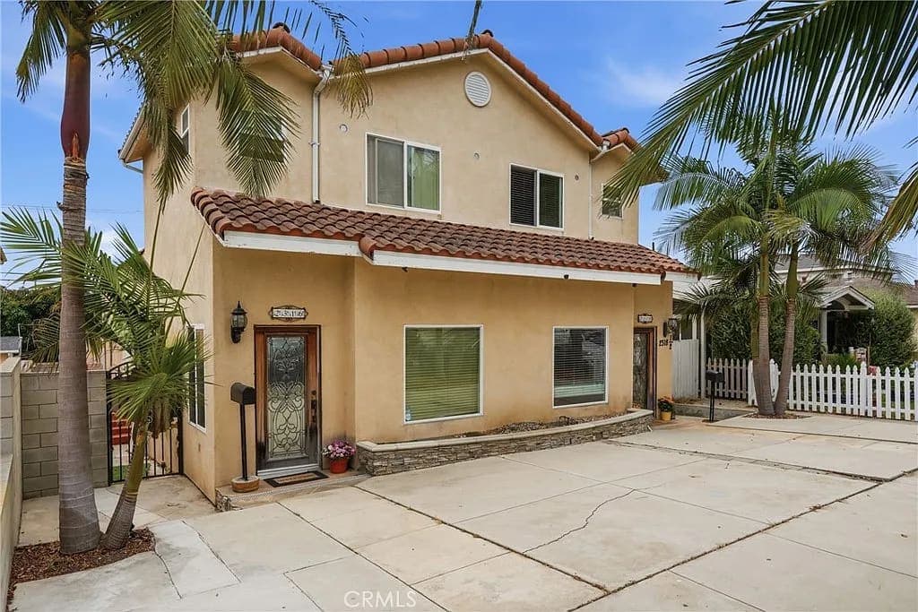 Price Improvement | Turnkey Triplex with New ADU — exterior view